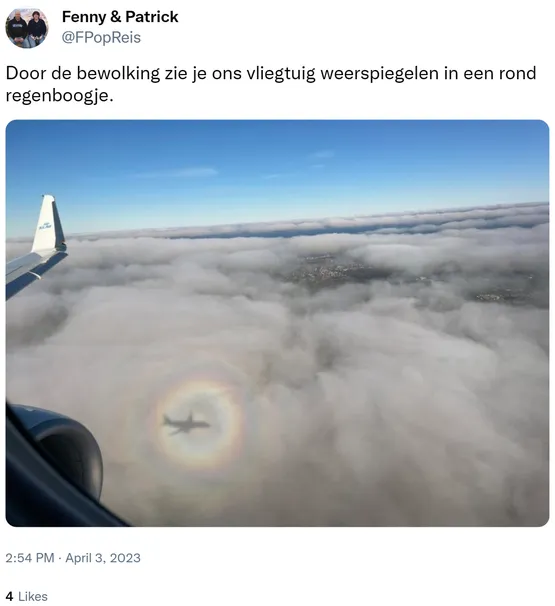 Door de bewolking zie je ons vliegtuig weerspiegelen in een rond regenboogje. https://t.co/hpuFGcWXEl
